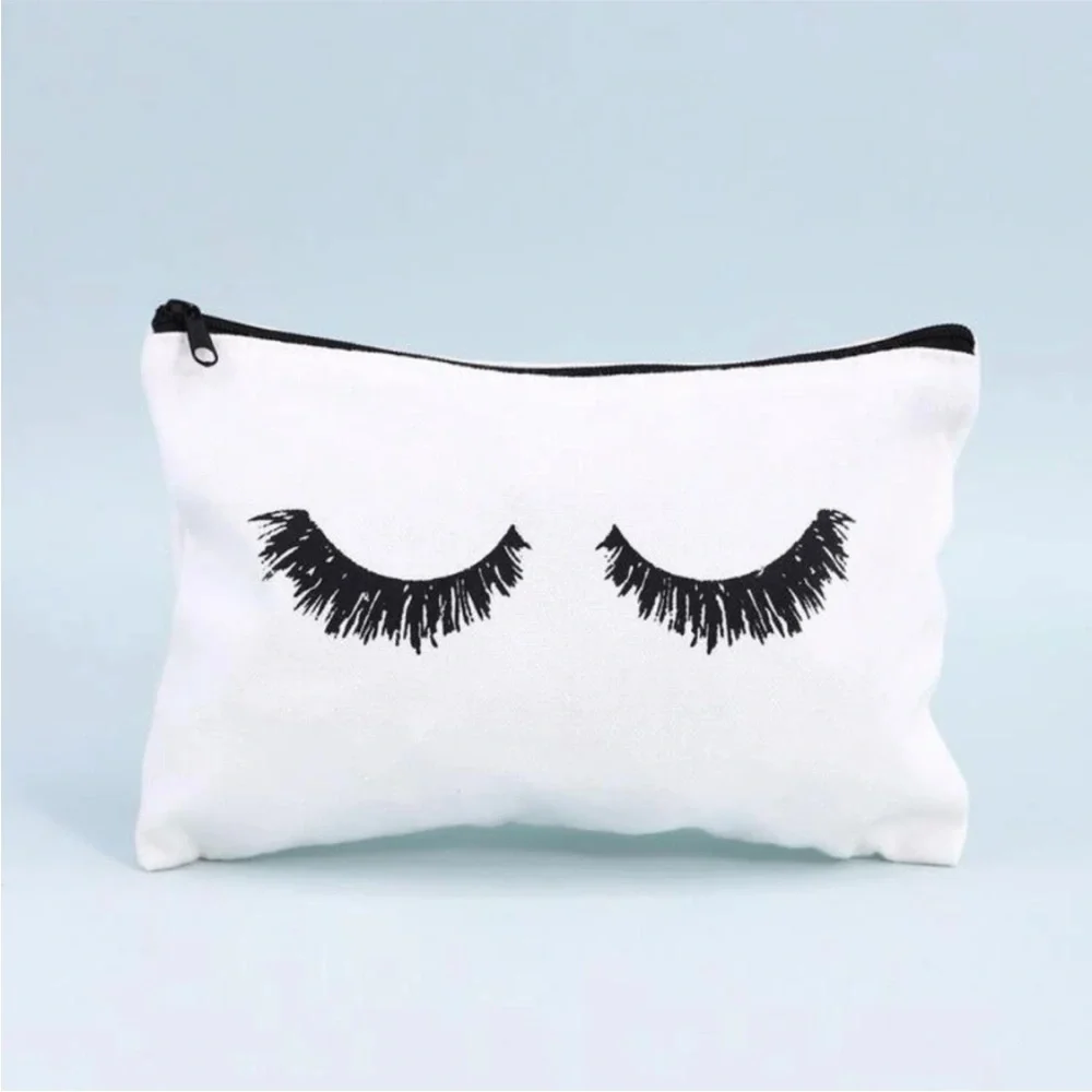 FREE 💫 Eyelash Print Canvas Cosmetics Makeup Bag in White